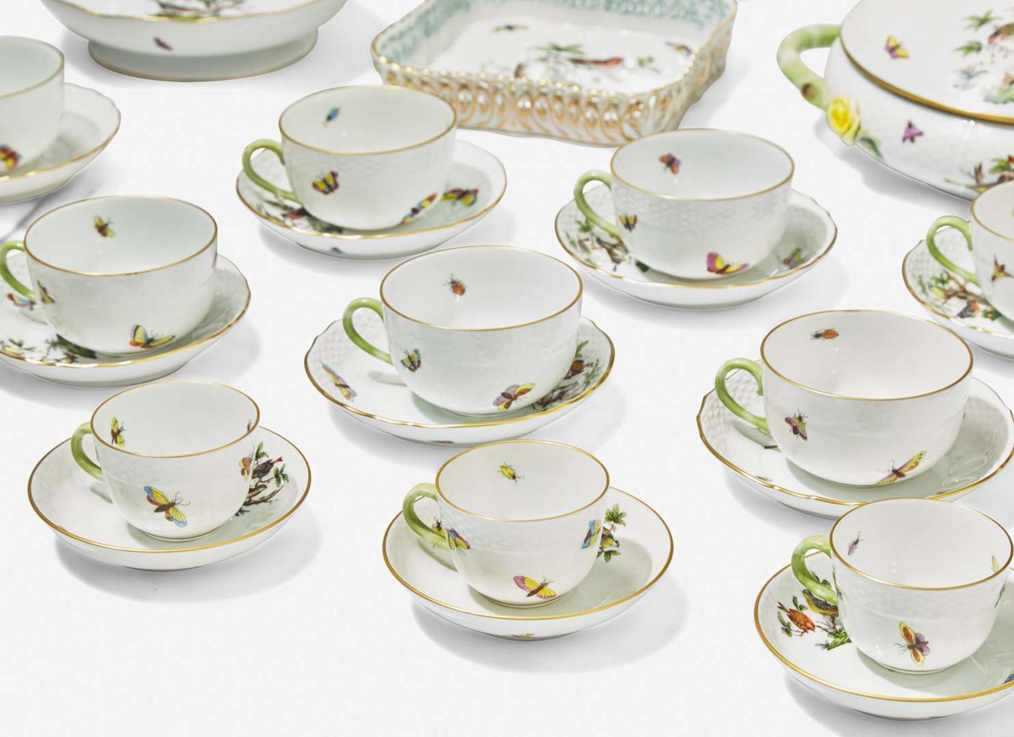 An extensive Herend porcelain dinner, tea, and coffee service in the “Rothschild Bird” pattern, Hungary, modern, with blue-printed factory marks