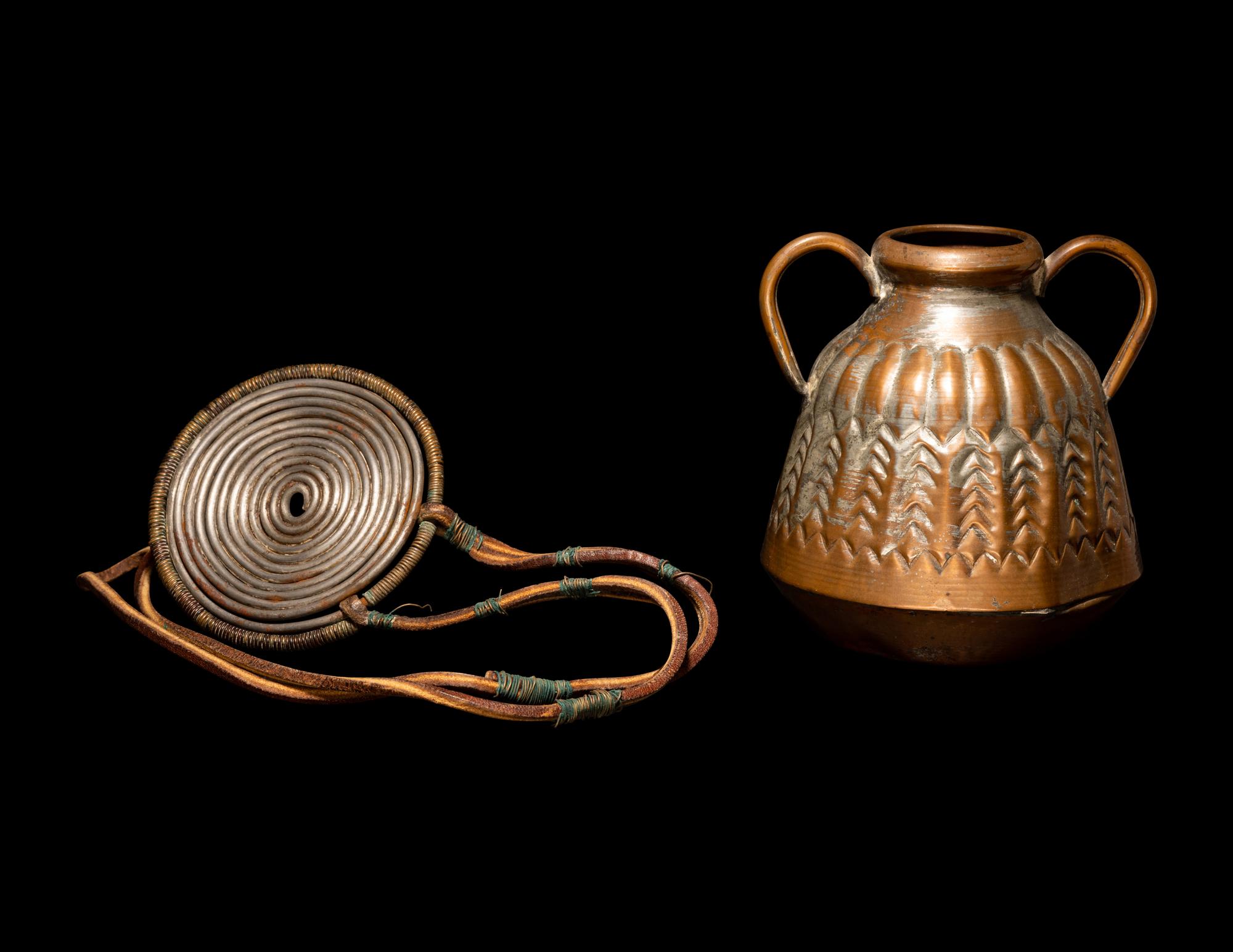 An African Metalwork Pendant and Copper Jar