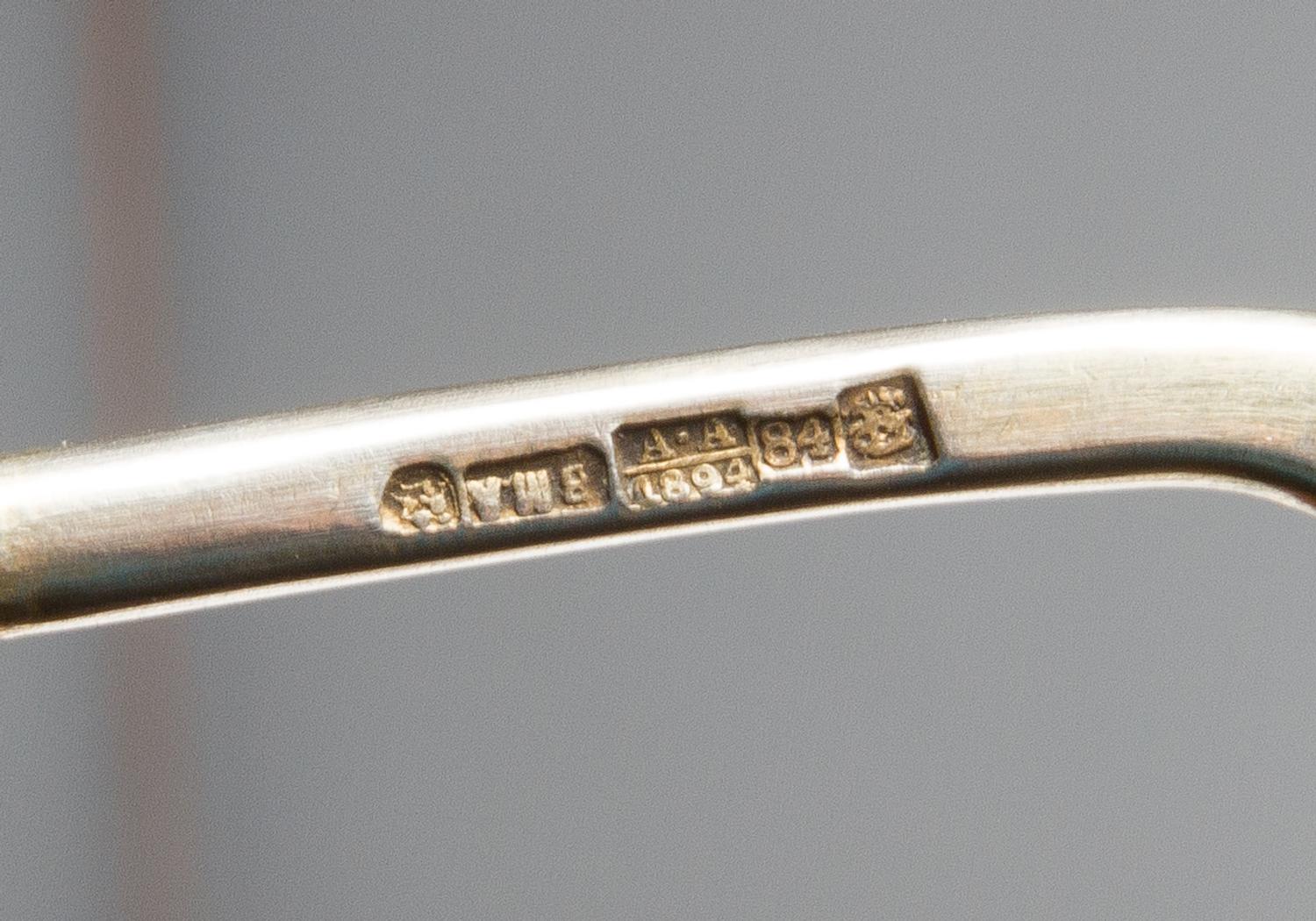 A Russian Silver-Gilt and Enamel Spoon, Mark of Ashmarin Mateevich, assay mark of Anatoly Artsybashev, Moscow, 1894, having an enamel f