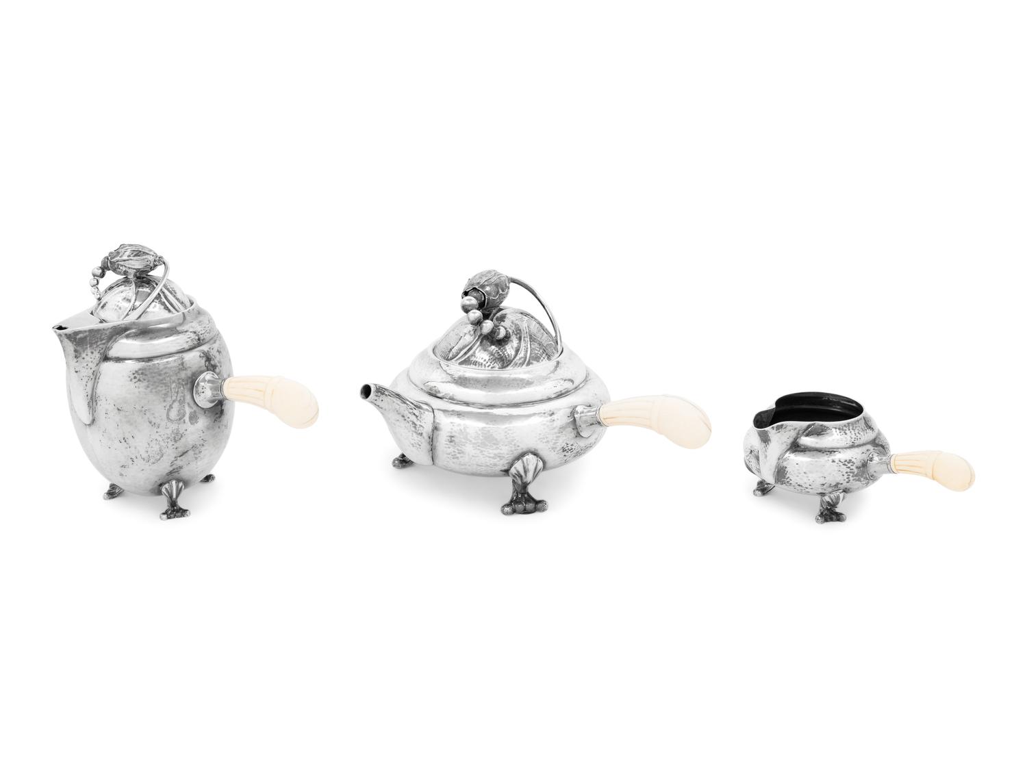 A Georg Jensen Silver Blossom Three-Piece Tea and Coffee Service