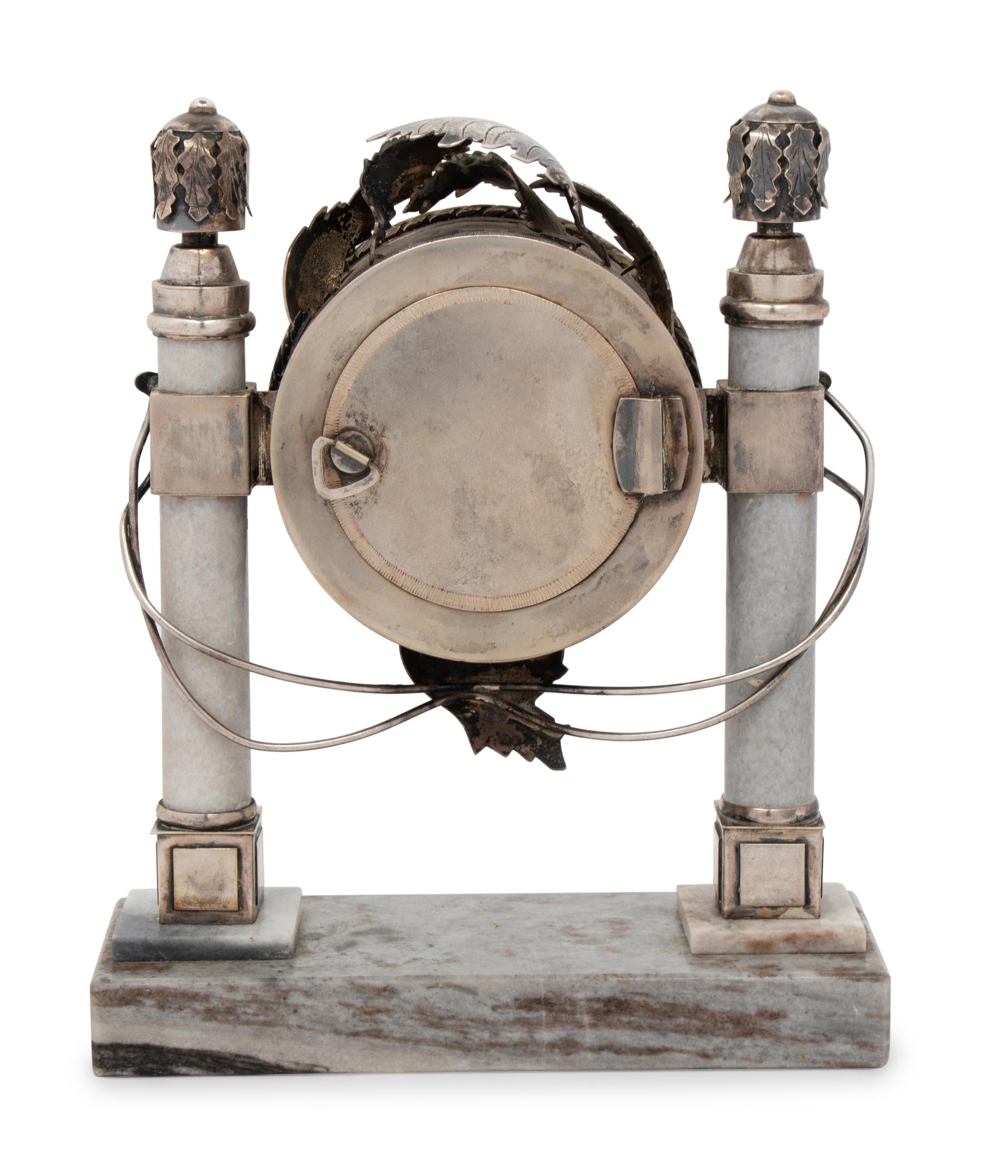 A Continental Silver and Marble Table Clock