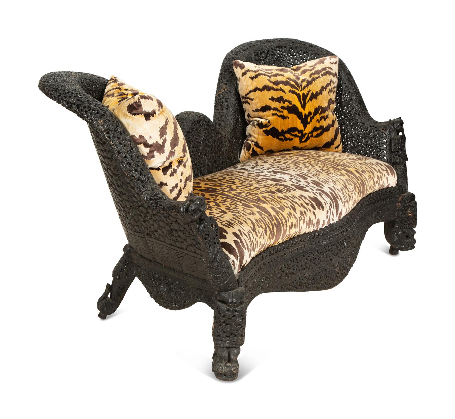 Two Similar Anglo-Burmese Carved Teak Settees
