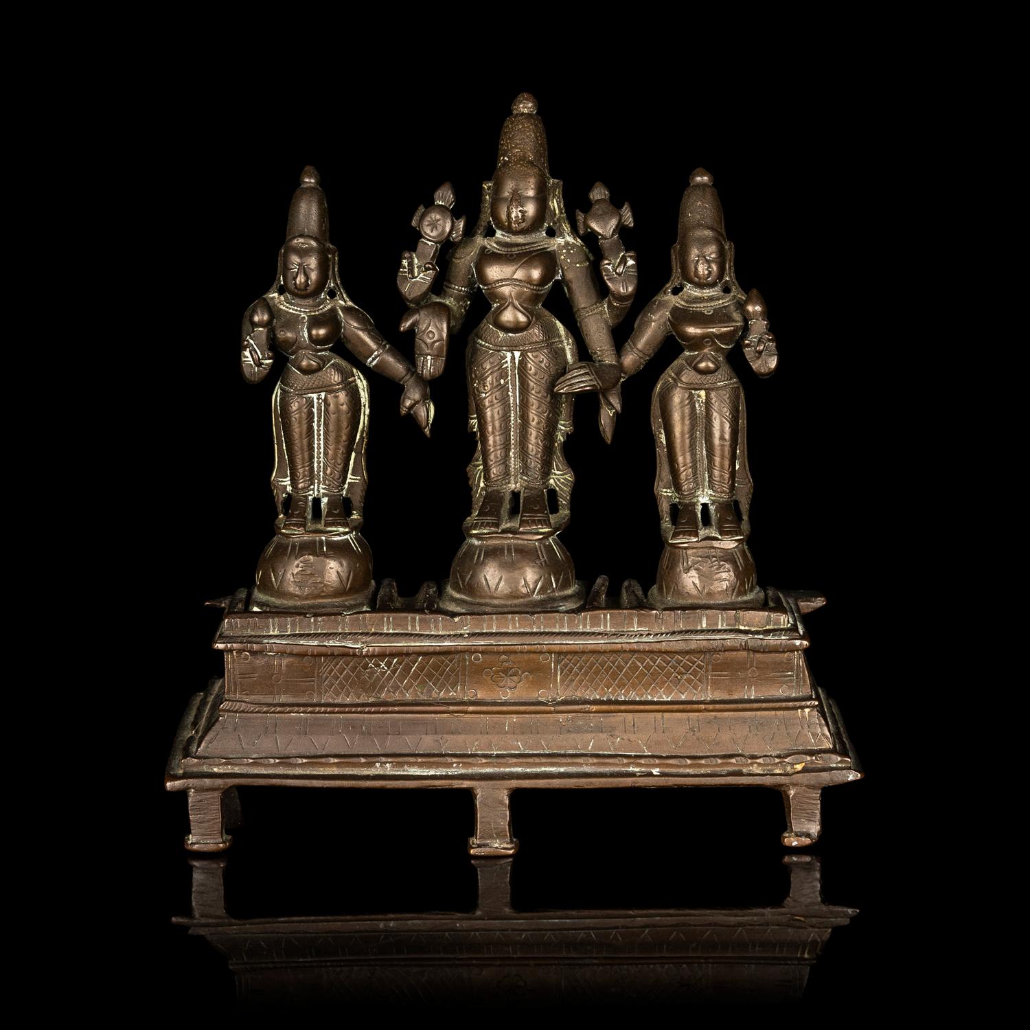 An Indian Bronze Statue of Vishnu with Sridevi and Bhudevi