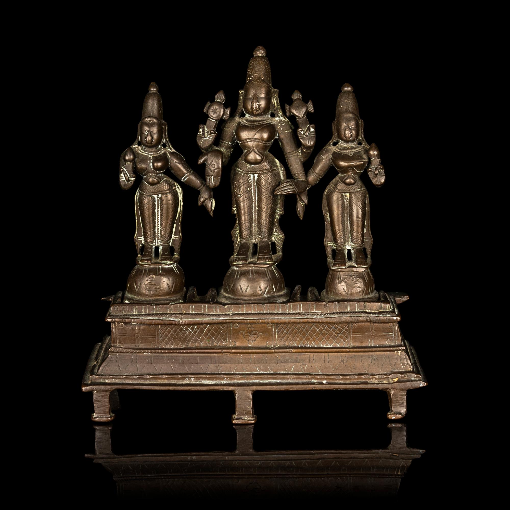 An Indian Bronze Statue of Vishnu with Sridevi and Bhudevi
