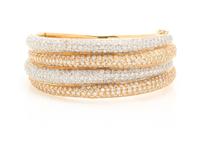 A Two Tone Gold and Diamond Bangle Bracelet, 53.00 dwts.