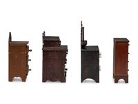 Four Painted or Stained Miniature Chests of Drawers