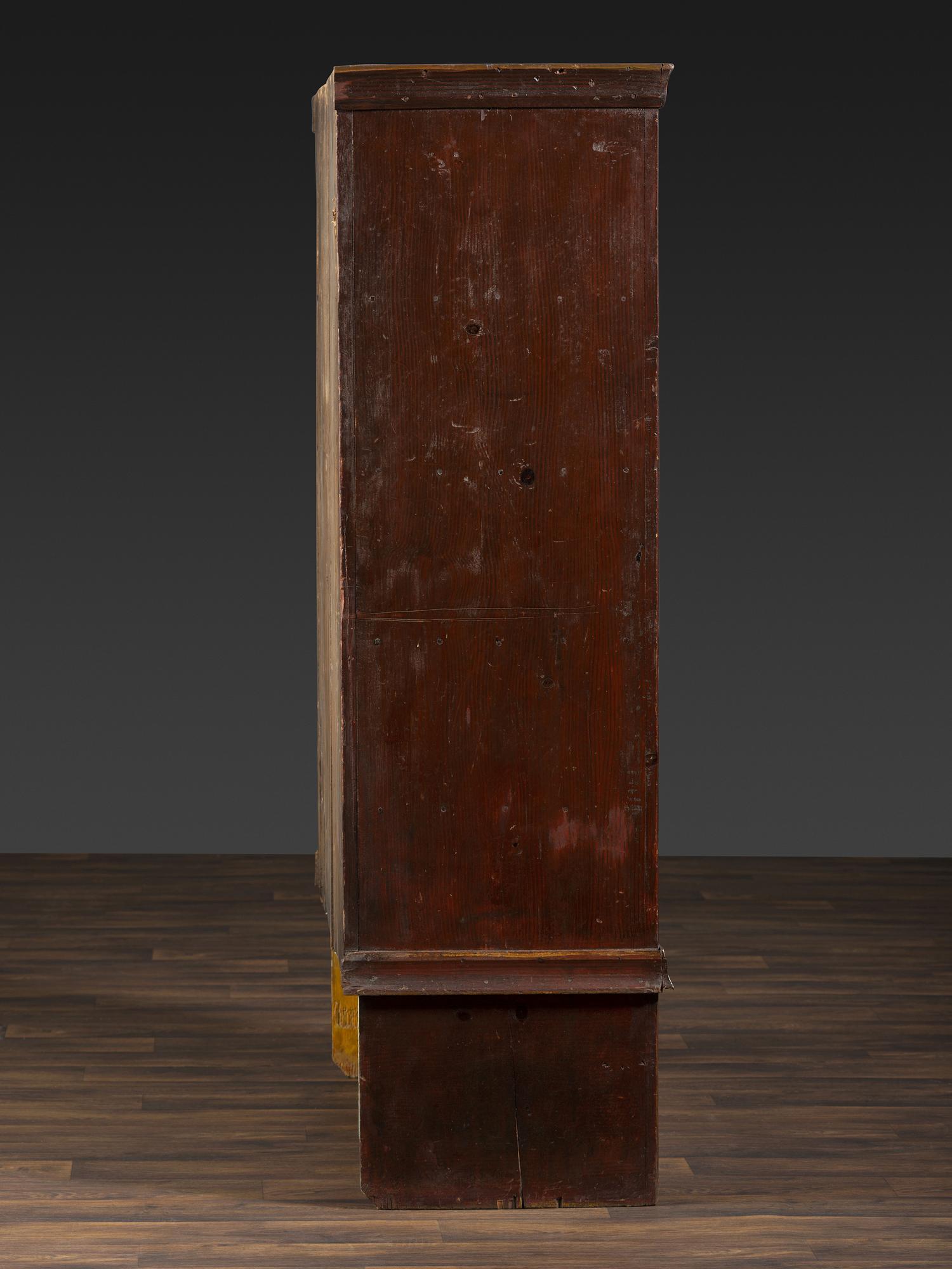 A Country Grain Painted Pine and Pressed Sheet Tin Pie Safe and Marriage Cabinet