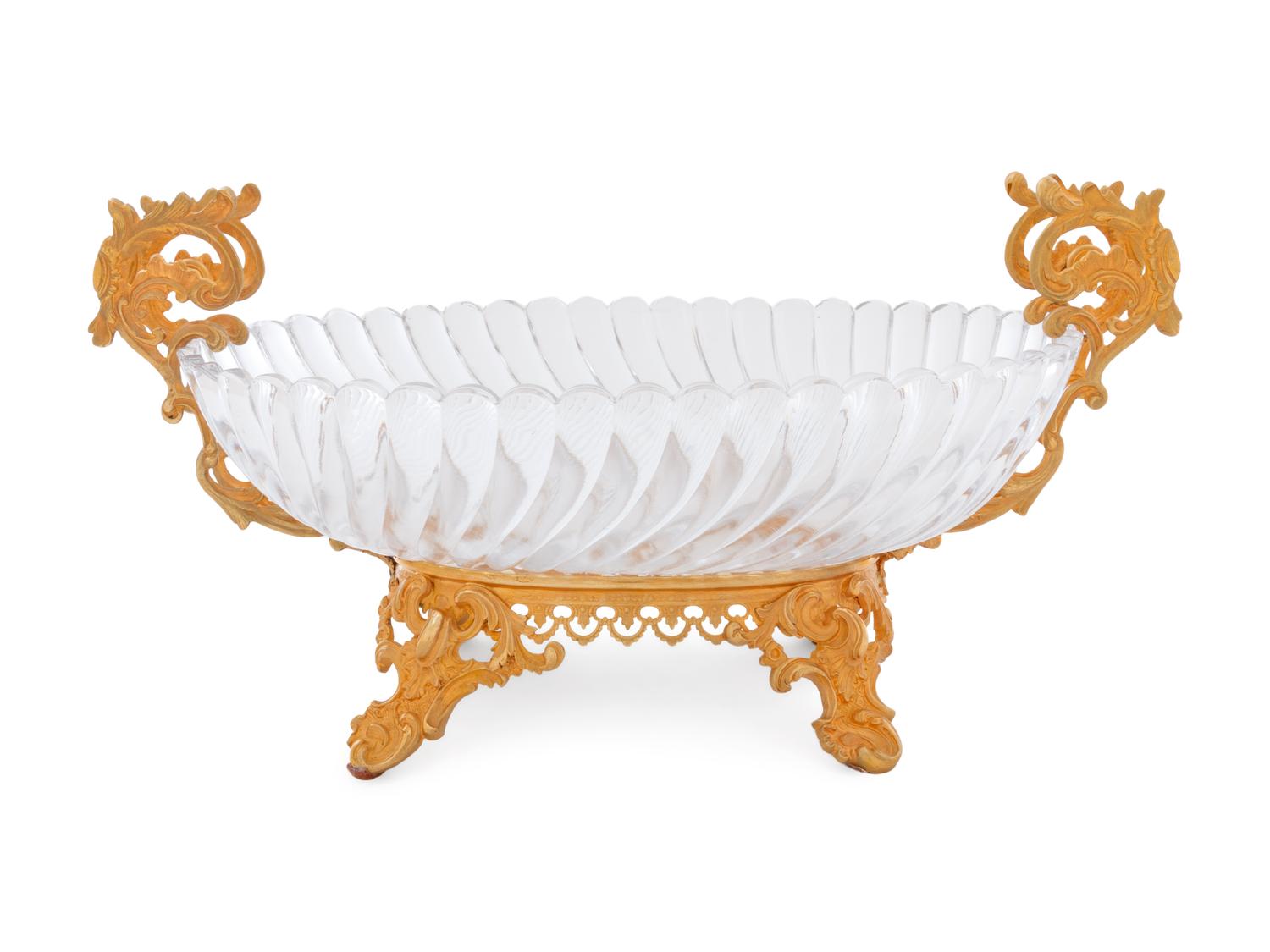 A Louis XV Style Gilt Bronze and Glass Table Garniture