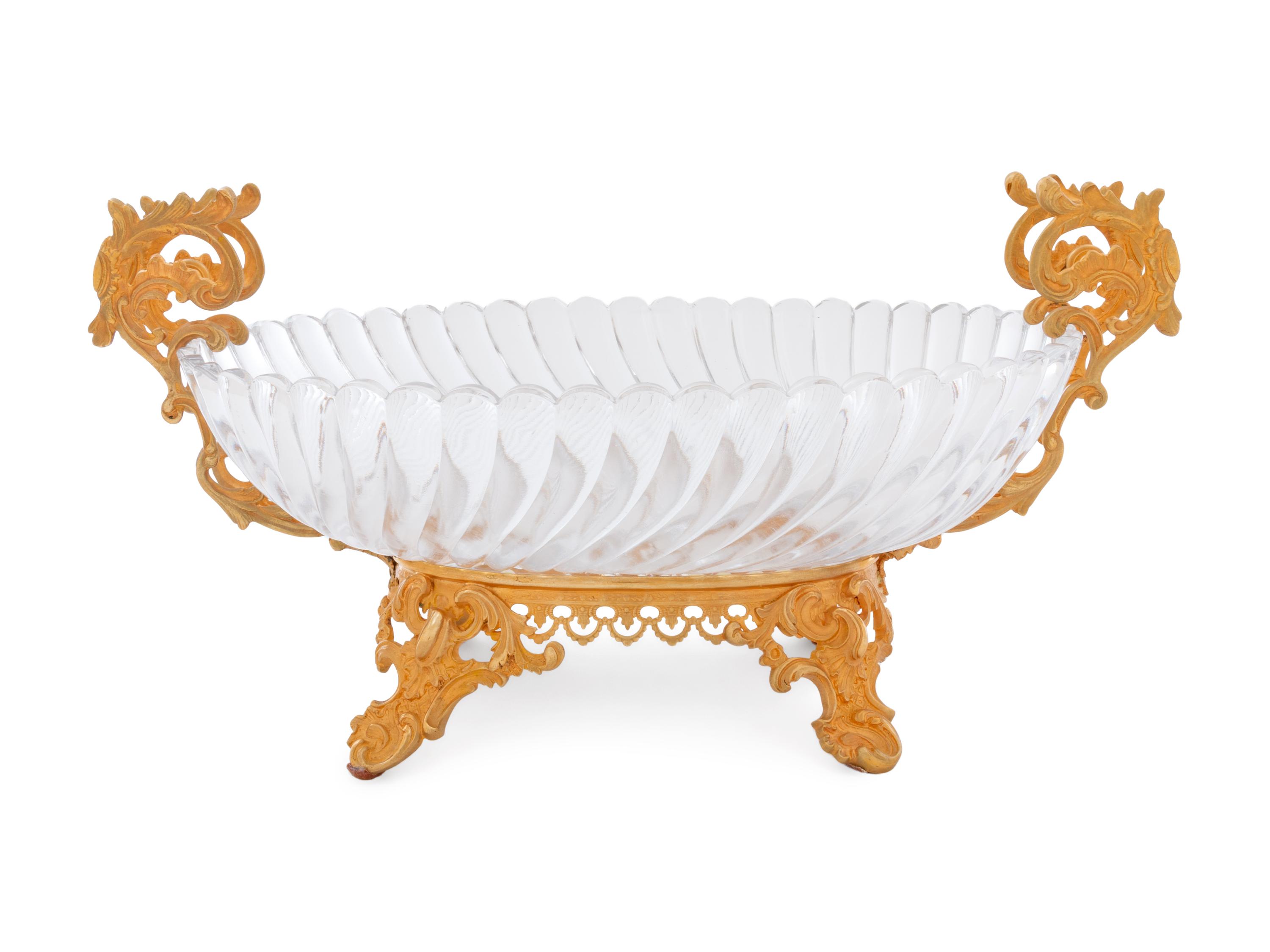 A Louis XV Style Gilt Bronze and Glass Table Garniture