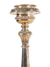 A Pair of Monumental Silvered Metal Altar Sticks