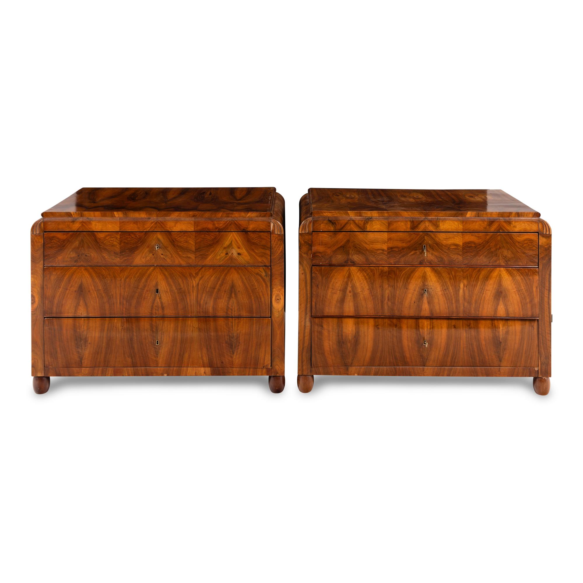 A Pair of Austrian Walnut Commodes