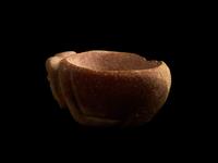 A Mesopotamian Red Marble Bowl in the Form of a Ram