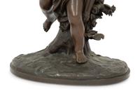 A French Bronze Figure of Eros on a Wood Base