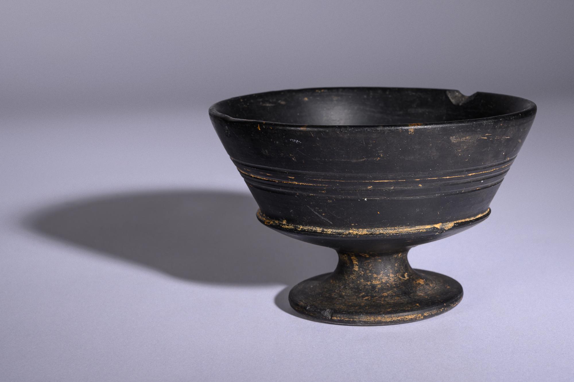 An Etruscan Bucchero Footed Cup