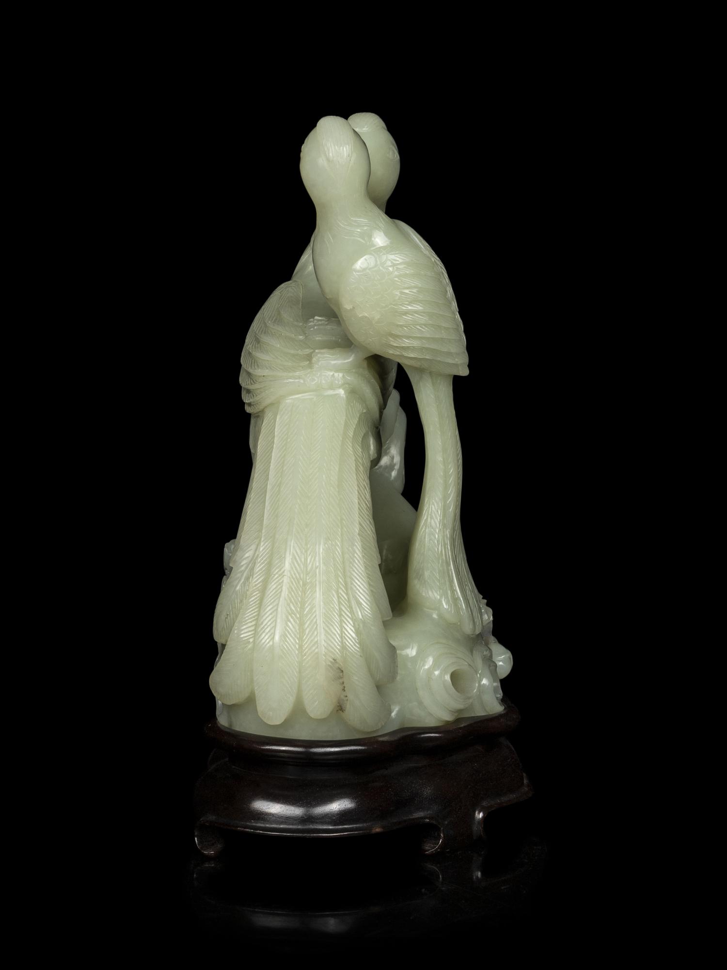 A Chinese Pale Celadon Jade Carving of Birds