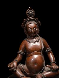 A Nepalese Bronze and Silver Figure of Seated Kubera