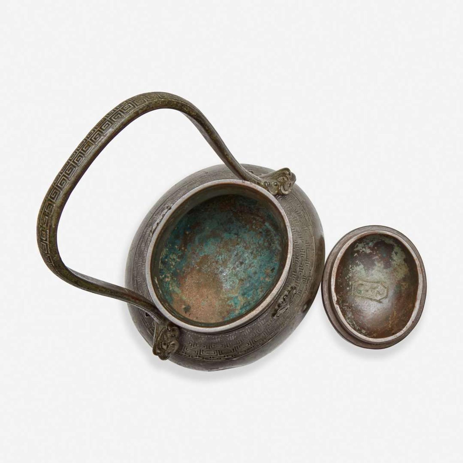A Chinese archaistic patinated bronze covered wine vessel, you 倣古风格卣 late Ming/Qing dynasty ?????