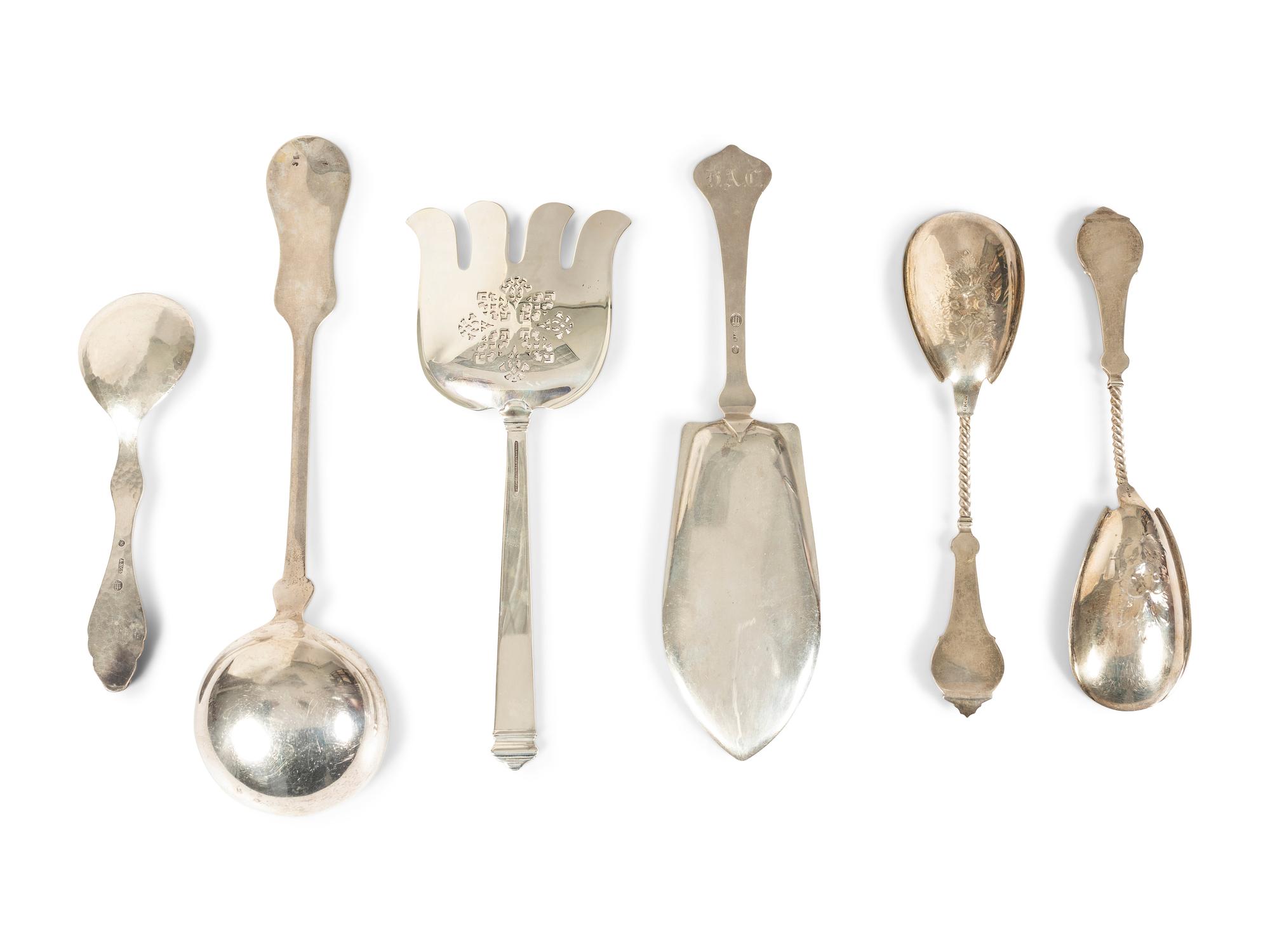 A Group of Silver Serving Flatware