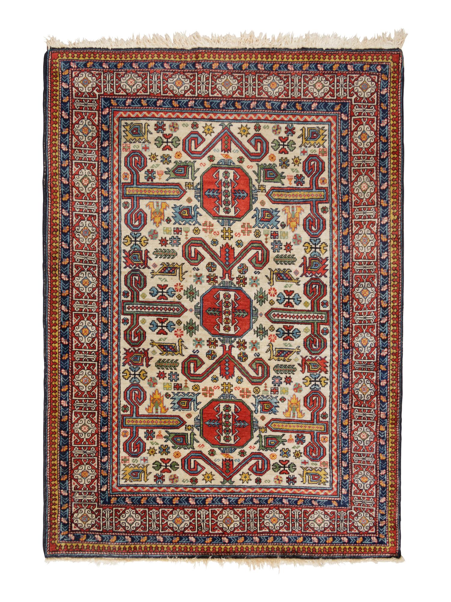 A Perepedil Ivory-Ground Wool Rug