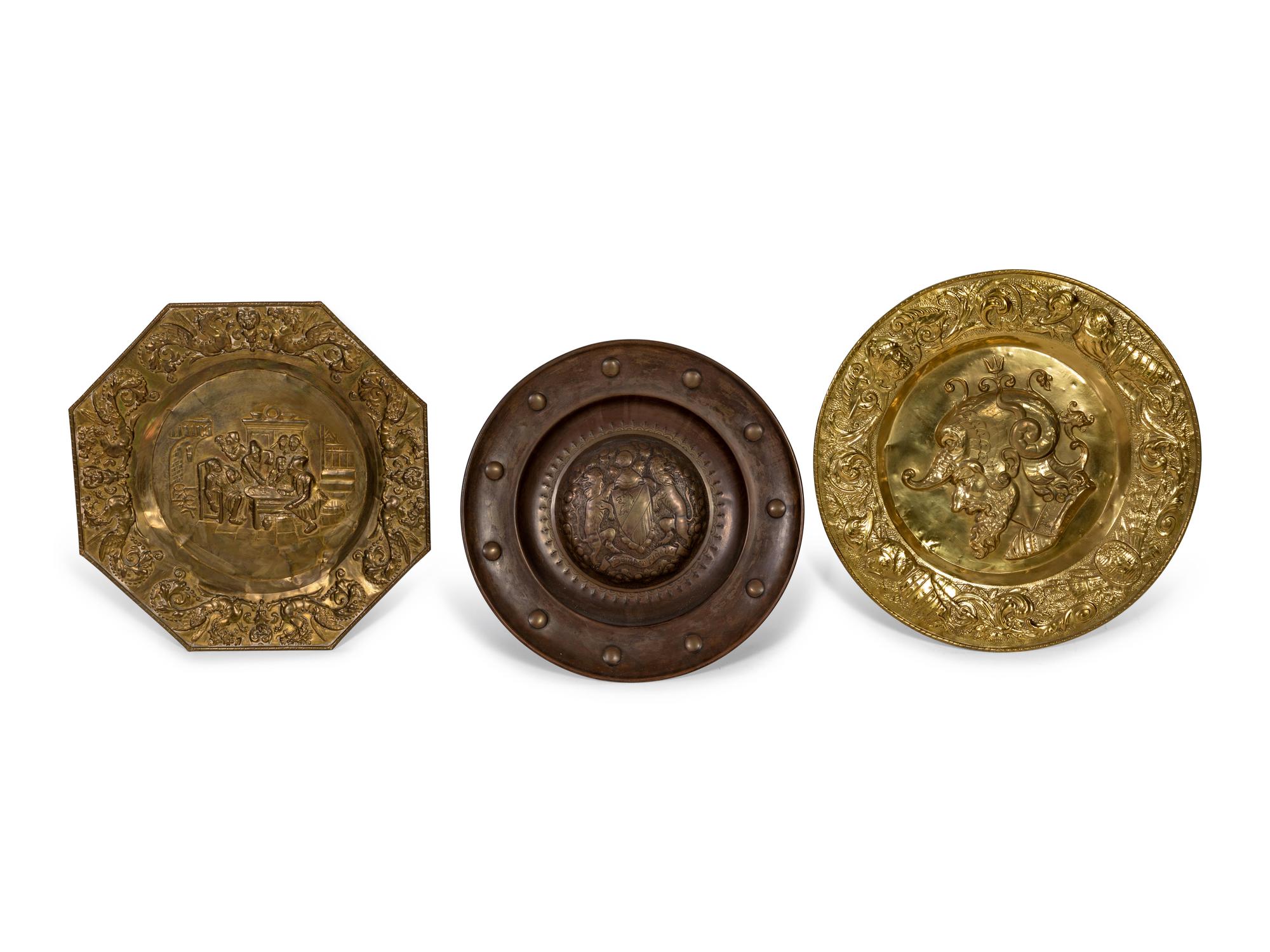 Three Gilt and Patinated Metal Chargers