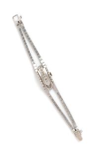 A Retro White Gold and Diamond Surprise Wristwatch, Circa 1953, 19.20 dwts.