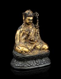 A Tibetan Parcel Gilt Bronze Figure of Guru