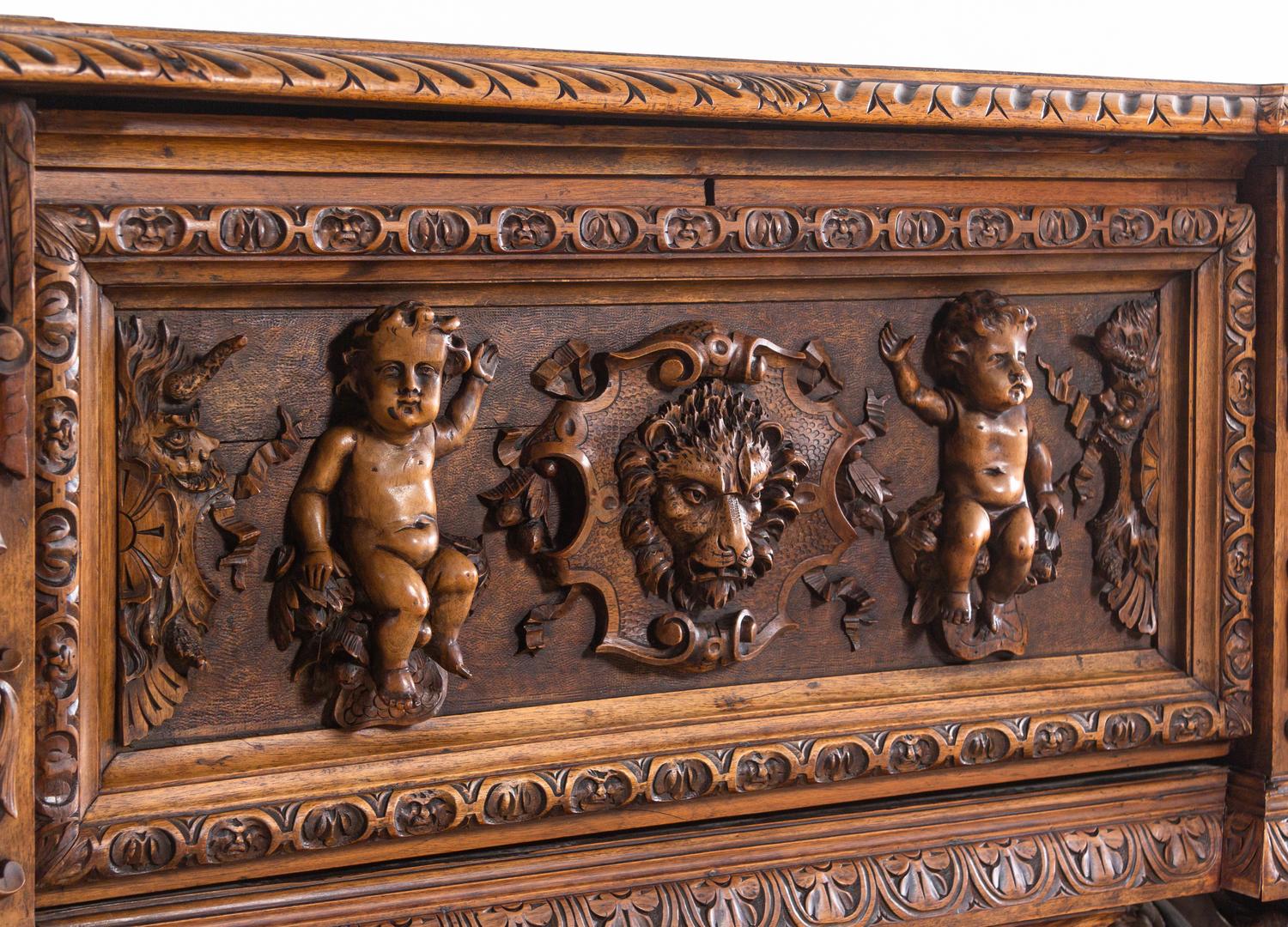 An Italian Renaissance Revival Carved Walnut Cassone on Stand