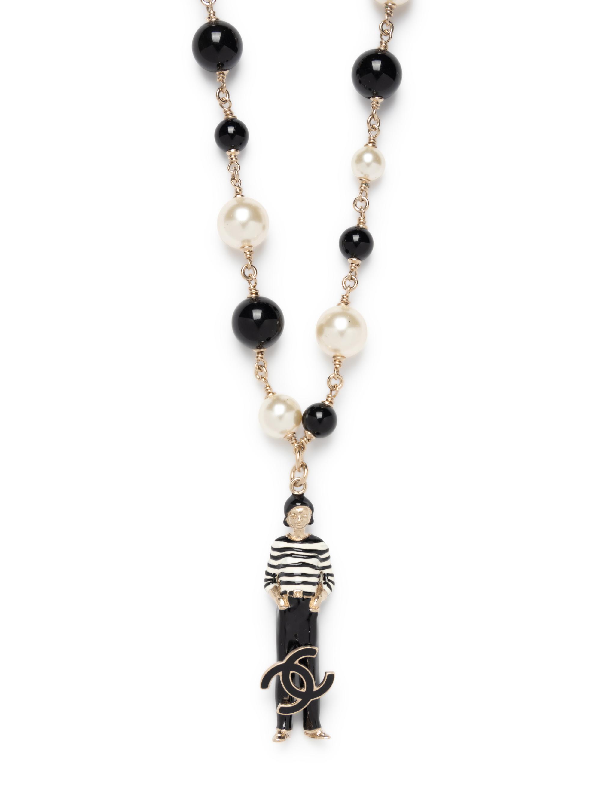 Chanel Faux Pearl & Black Bead Necklace with Figure Pendant, 2010