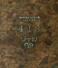 Tiffany Studios, EARLY 20TH CENTURY, a Zodiac pattern letter holder (418)
