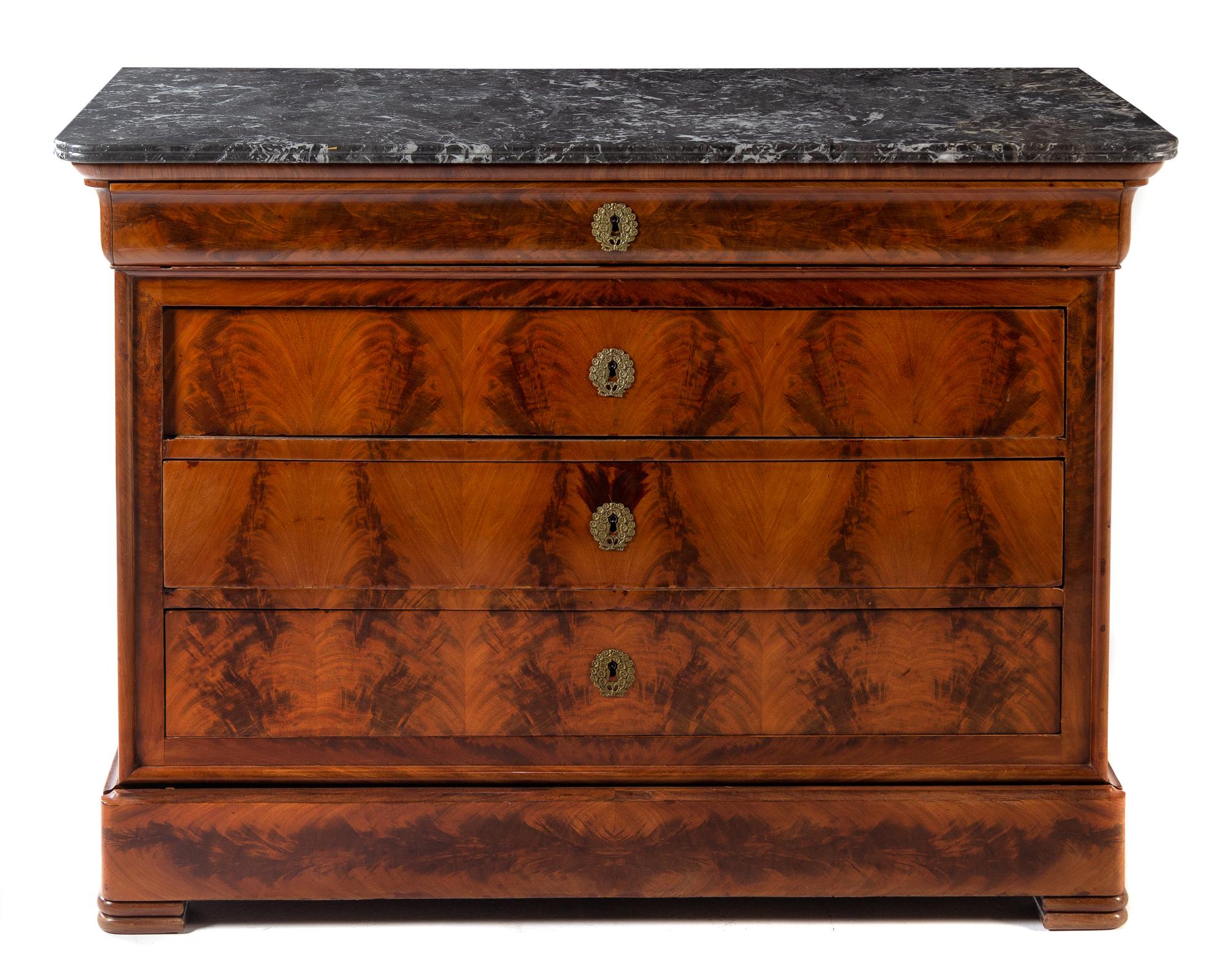 A Louis Philippe Chest of Drawers Height 37 1/2 x width 51 1/4 x depth 22 1/2 inches. — 19TH CENTURY