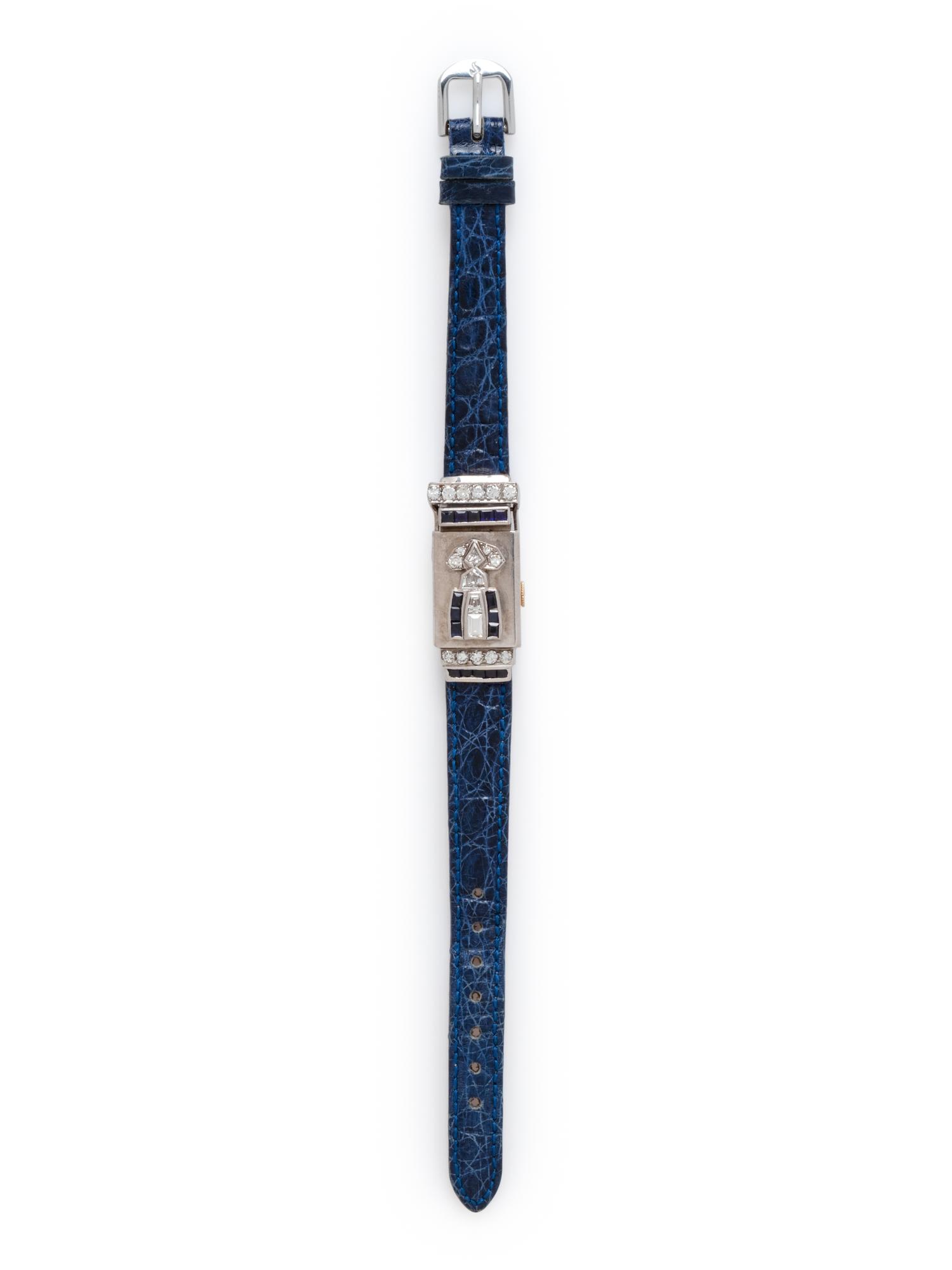 BULOVA, WHITE GOLD, DIAMOND AND SAPPHIRE SURPRISE WRISTWATCH