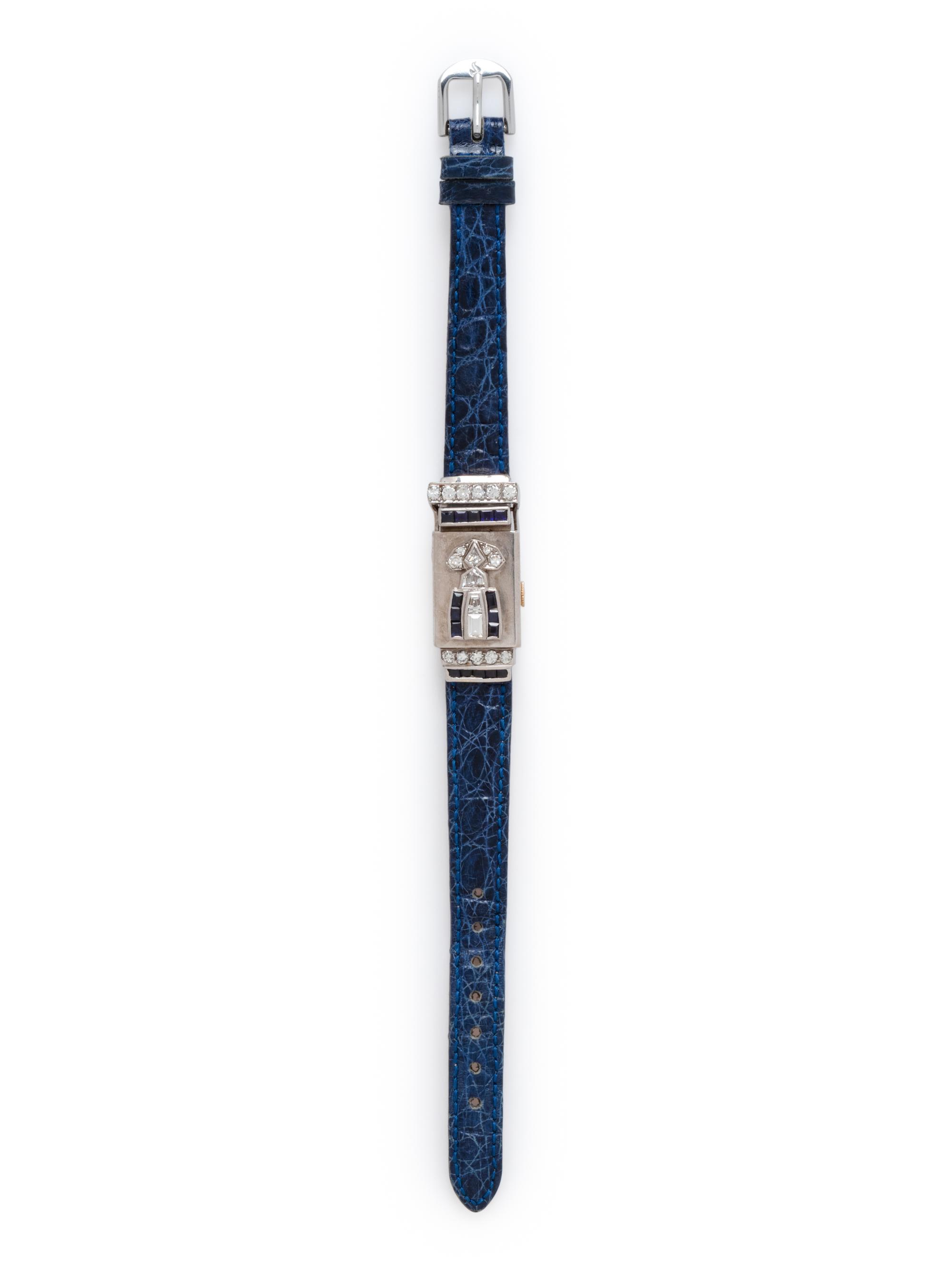 BULOVA, WHITE GOLD, DIAMOND AND SAPPHIRE SURPRISE WRISTWATCH