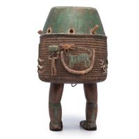 An Ashanti Carved and Gouged Painted Wood Breasted Drum