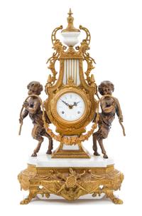 A Neoclassical Gilt and Patinated Metal Mantle Clock, Imperial Height 23 1/2 inches. — SECOND HALF 20TH CENTURY