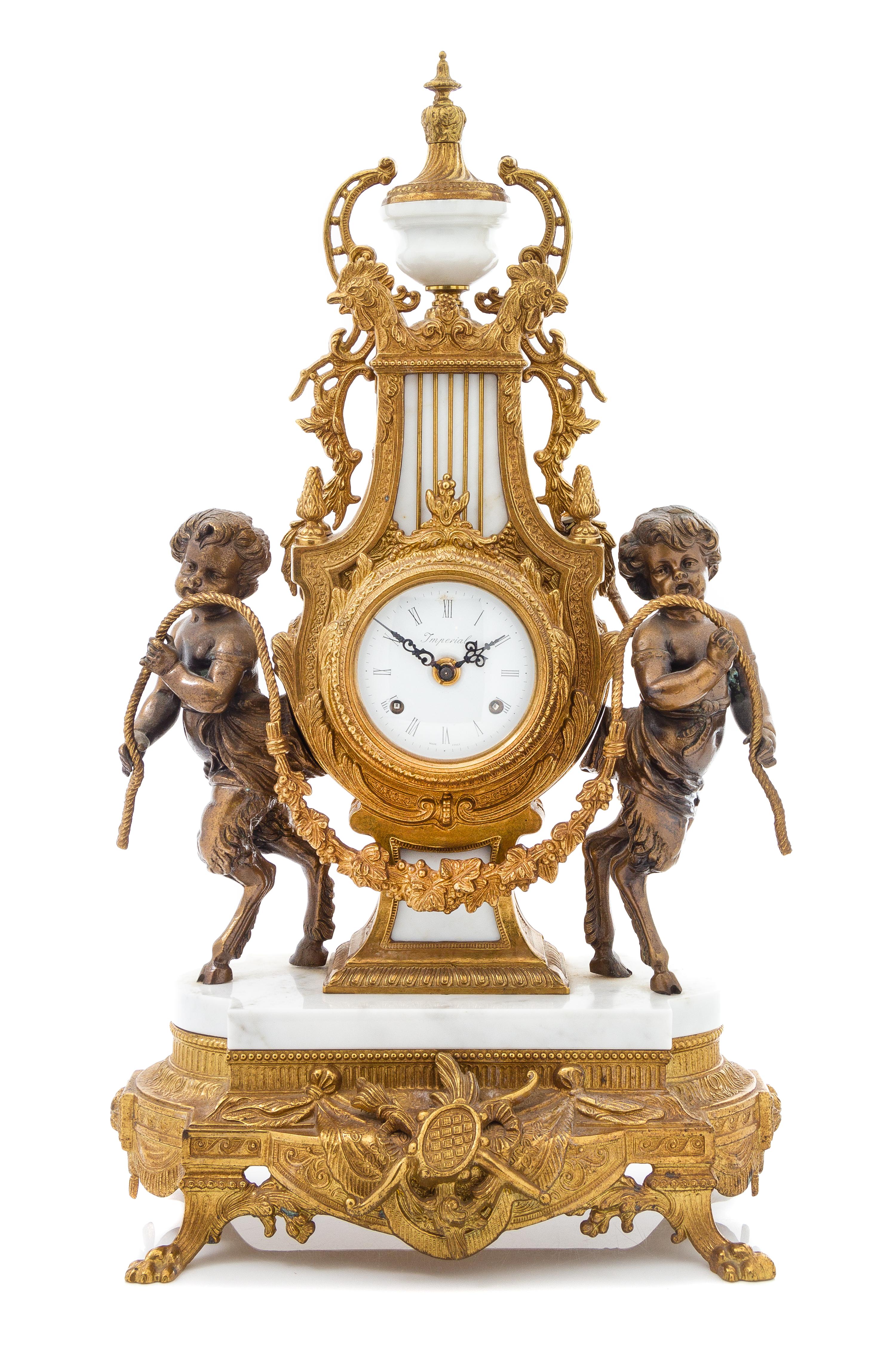 A Neoclassical Gilt and Patinated Metal Mantle Clock, Imperial Height 23 1/2 inches. — SECOND HALF 20TH CENTURY