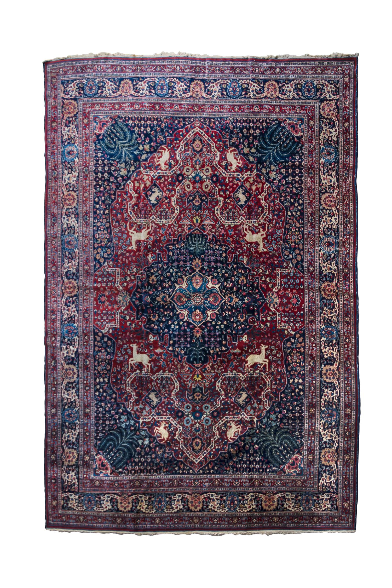 A Tabriz Wool Rug 12 feet 6 inches x 9 feet 3 inches.