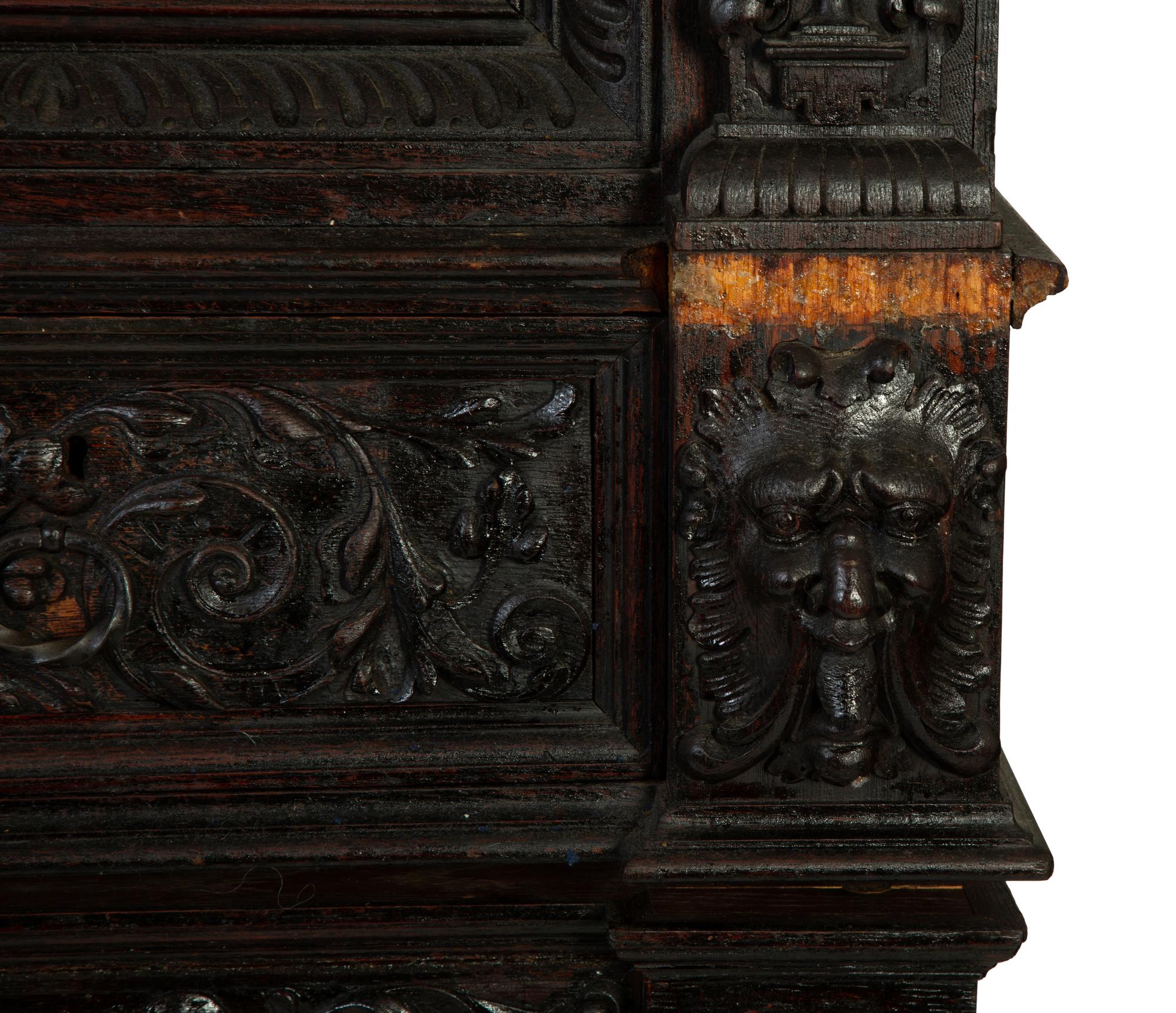 An Italian Baroque Style Carved Oak Cabinet on Stand — 18TH CENTURY