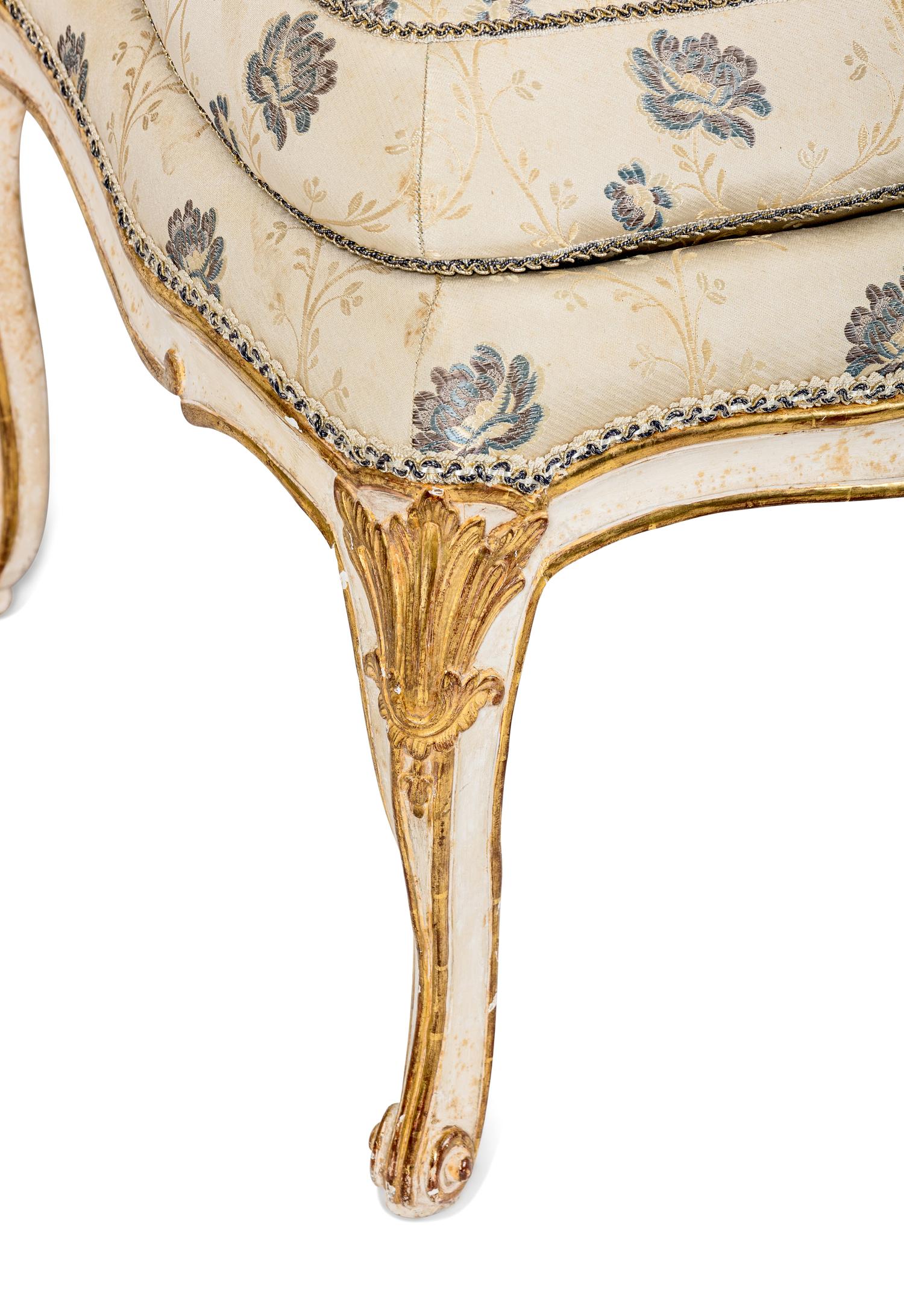 A Pair of Louis XV White-Painted and Parcel-Gilt Side Chairs