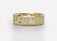 An 18K Yellow Gold Band with Accent Diamonds