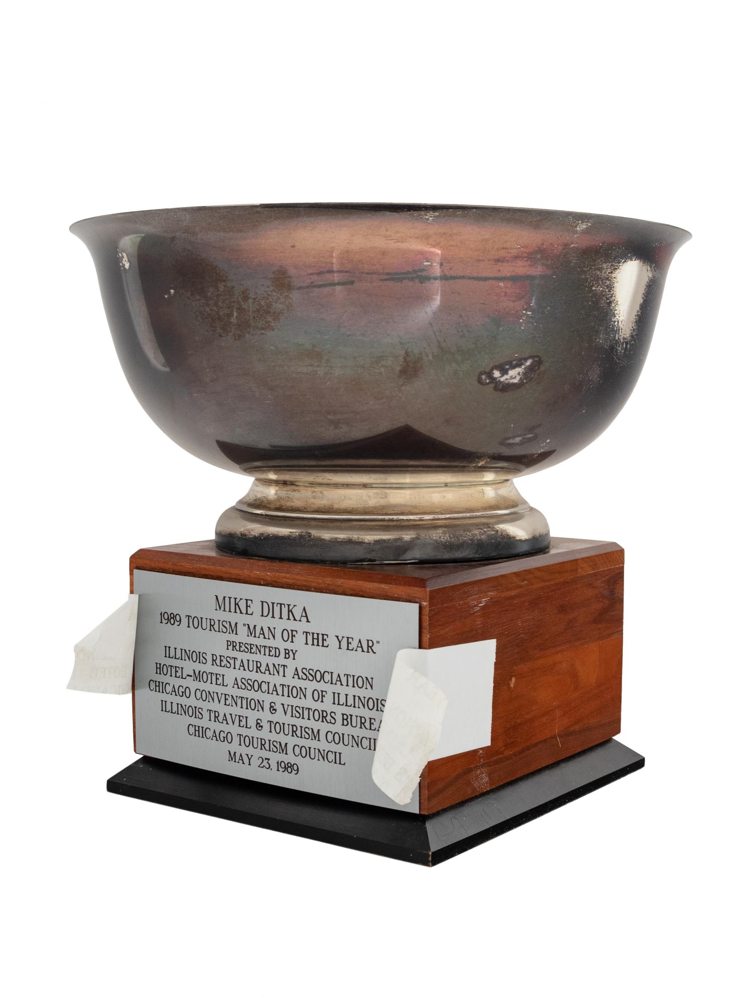 A 1989 Tourism Man Of The Year Trophy Awarded to Mike Ditka Formerly Displayed at Mike Ditka's Restaurant