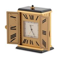 A Cartier Engraved Brass and Onyx Travel Clock