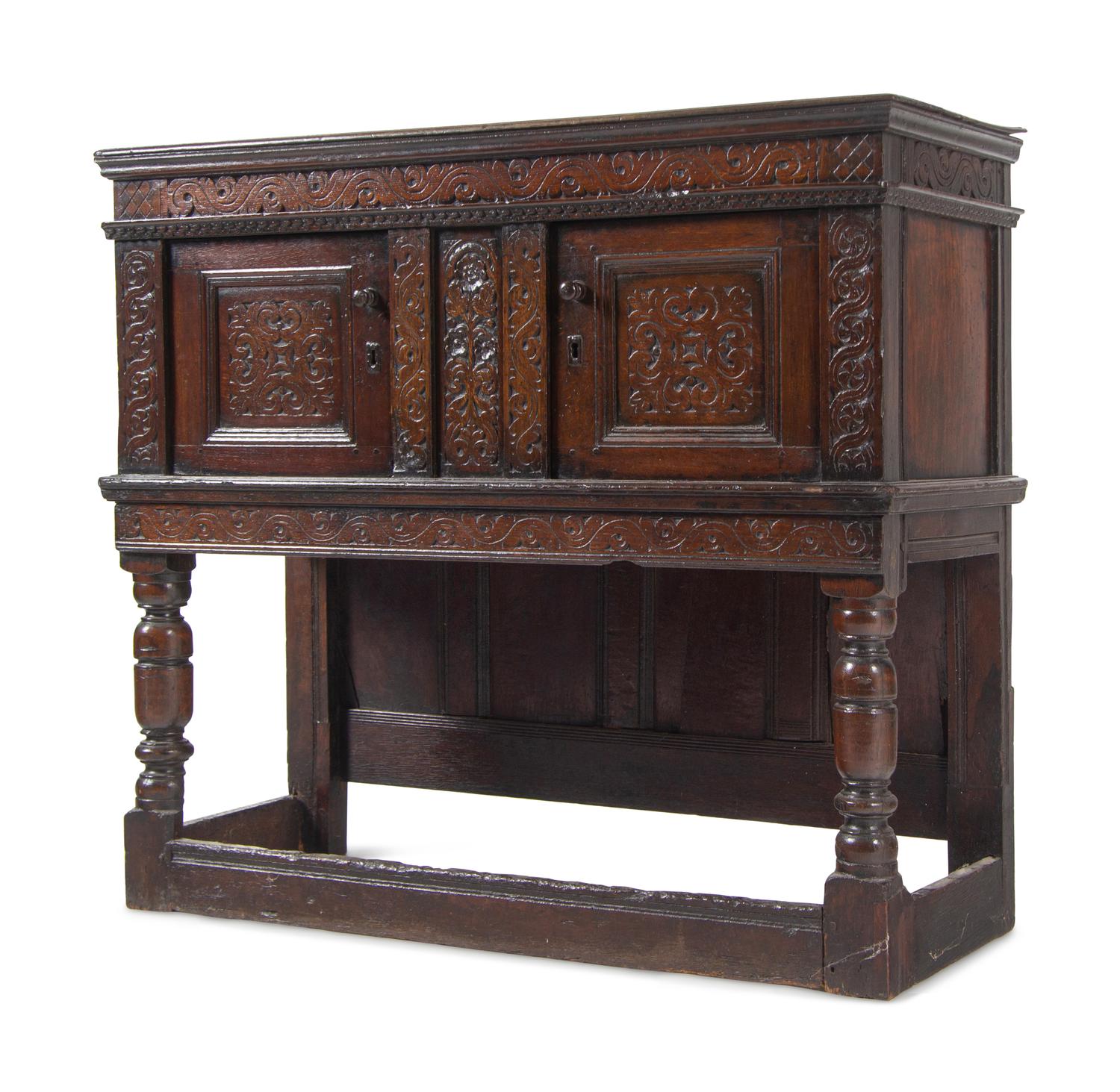 A Jacobean Carved Oak Court Cupboard