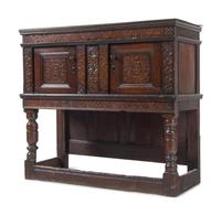 A Jacobean Carved Oak Court Cupboard