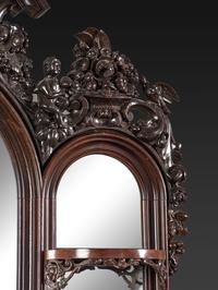 A Renaissance Revival Marble Mounted Carved and Laminated Rosewood Etagere