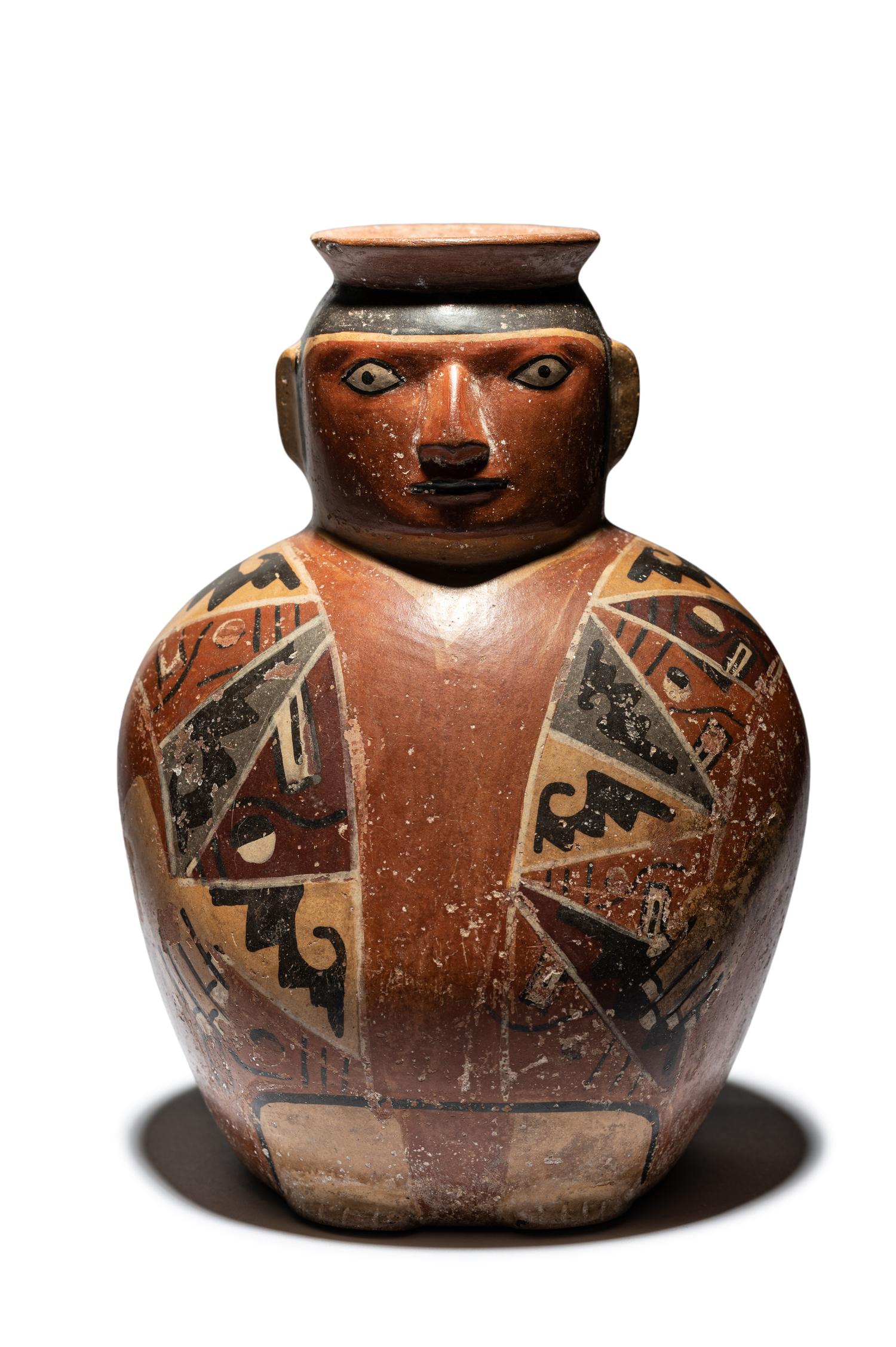 A Huari Man with Poncho Vessel