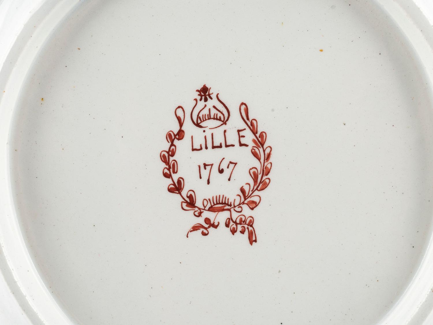 A Pair of French Faience Shield Form Plates