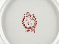 A Pair of French Faience Shield Form Plates