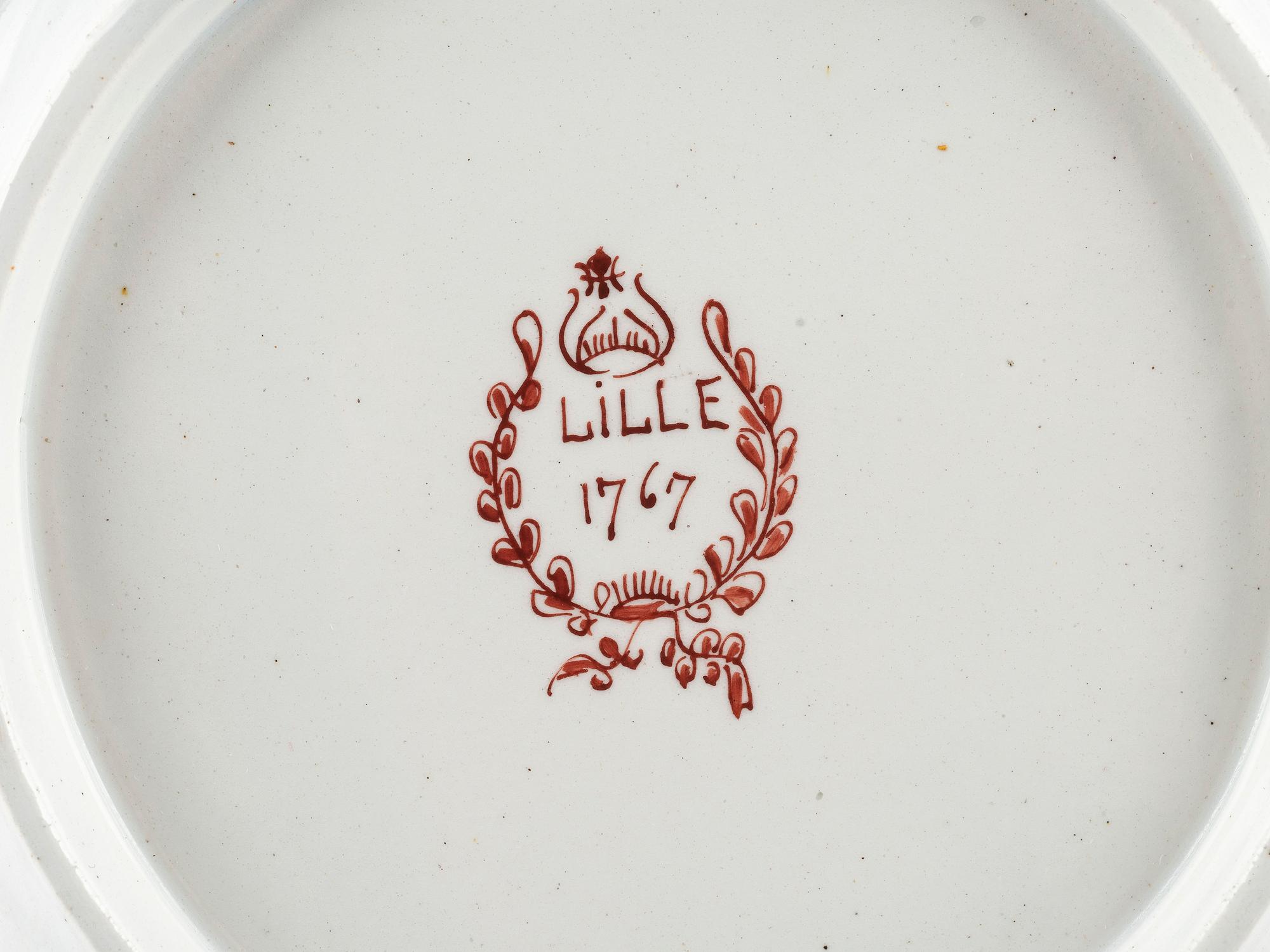 A Pair of French Faience Shield Form Plates
