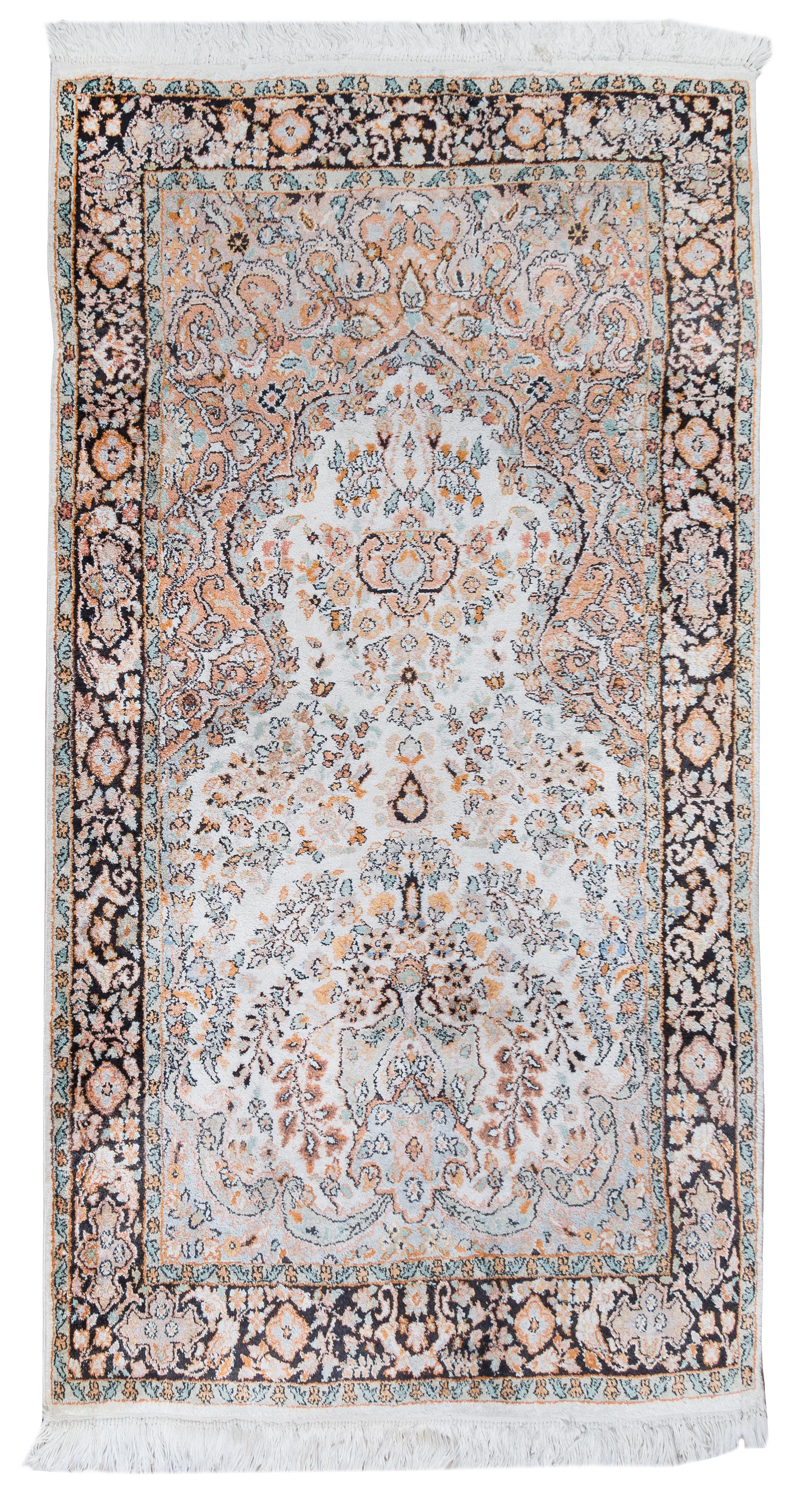 A Persian Silk and Cotton Prayer Rug 5 feet 2 inches x 3 feet 1 /4 inches. — 20TH CENTURY