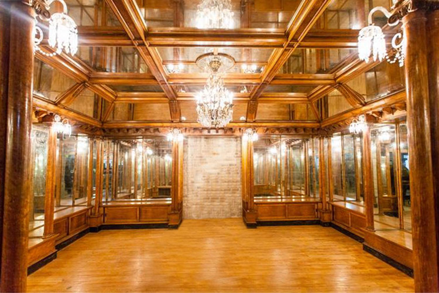 A Mirror inset and Bird's Eye Maple Nashville Jewelry Store Interior 255" W x 223" D x 120.5" — United States, Circa 1913